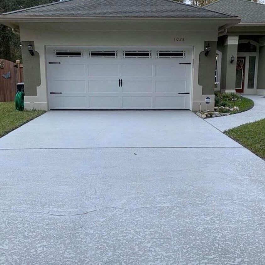 A large concrete driveway that is stamped