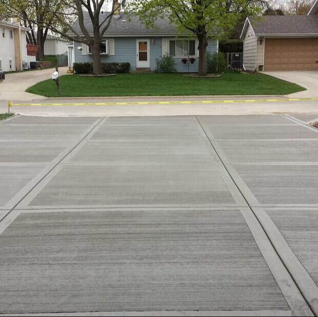 A concrete driveway with proper cuts